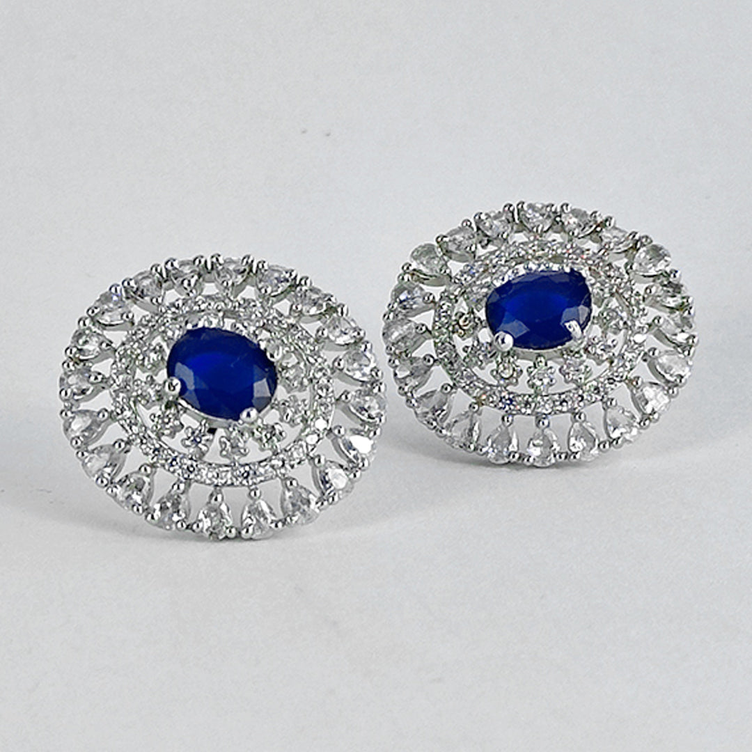 (Circlet Charm earrings (blue)) shown in close up from Al Musk Jewellery collection.