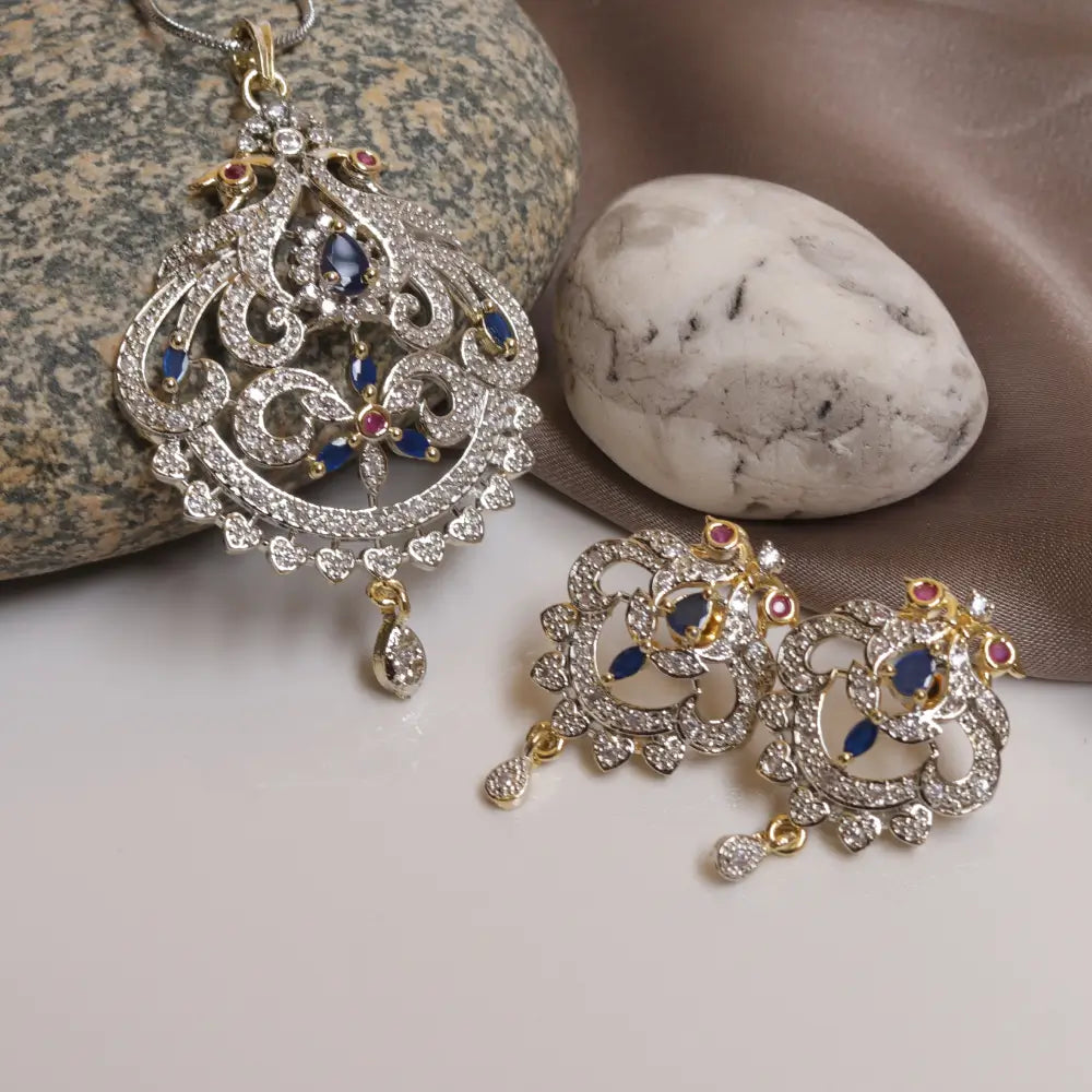  (Unique Silver Tone Blue Lakshmi CZ Locket Set) shown in close up from Al Musk Jewellery collection.