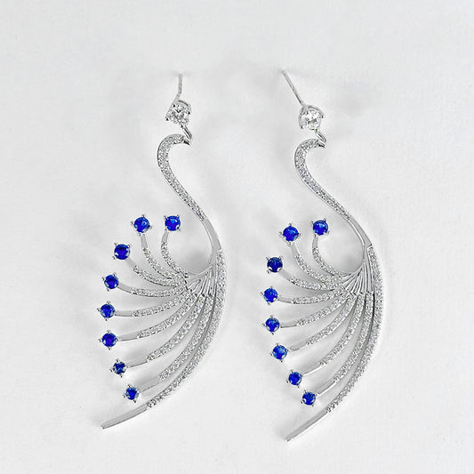Image of (Blue silver peacock earrings) from an exquisite collection by Al Musk Jewellery.