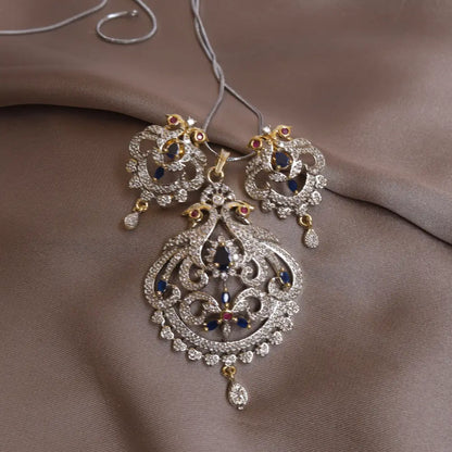  (Unique Silver Tone Blue Lakshmi CZ Locket Set) shown in close up from Al Musk Jewellery collection.