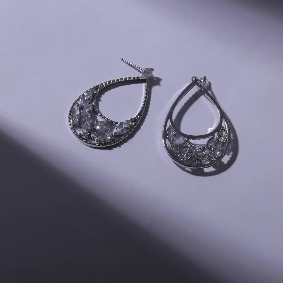 (Silver Moonbeam Drops) shown in close up from Al Musk Jewellery collection.