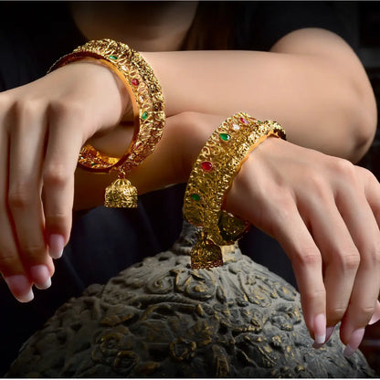 Image of (Jeweled Jhumka Latkan Bangles) from an exquisite collection by Al Musk Jewellery.