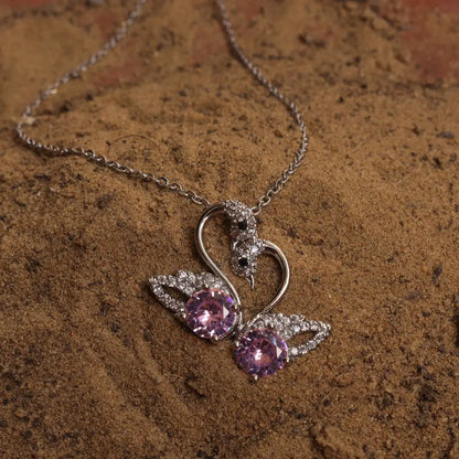 (Amethyst Swan Necklace) shown in close up from Al Musk Jewellery collection.