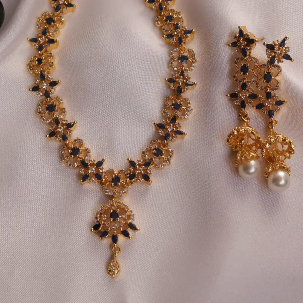  (Indian Rosewater CZ Necklace Set with long Earrings) shown in close up from Al Musk Jewellery collection.