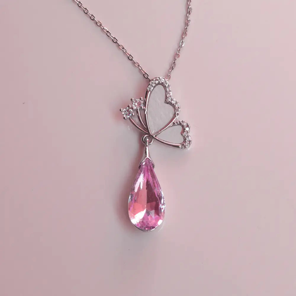 (Topaz Butterfly Pink Necklaces) shown in close up from Al Musk Jewellery collection.