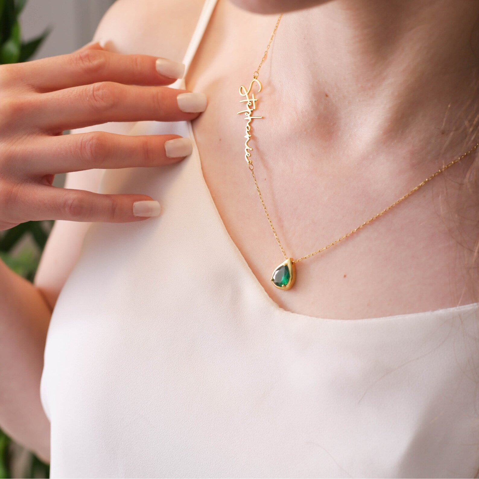  (Emraled Personalized Custom Necklace) shown in close up from Al Musk Jewellery collection.