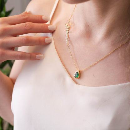  (Emraled Personalized Custom Necklace) shown in close up from Al Musk Jewellery collection.